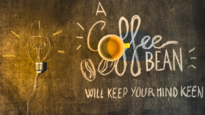 light-coffee-cup-with-written-text-chalkboard